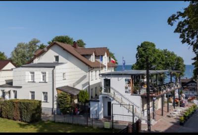 Noclegi Rewal - Domki i pokoje Gwiazda